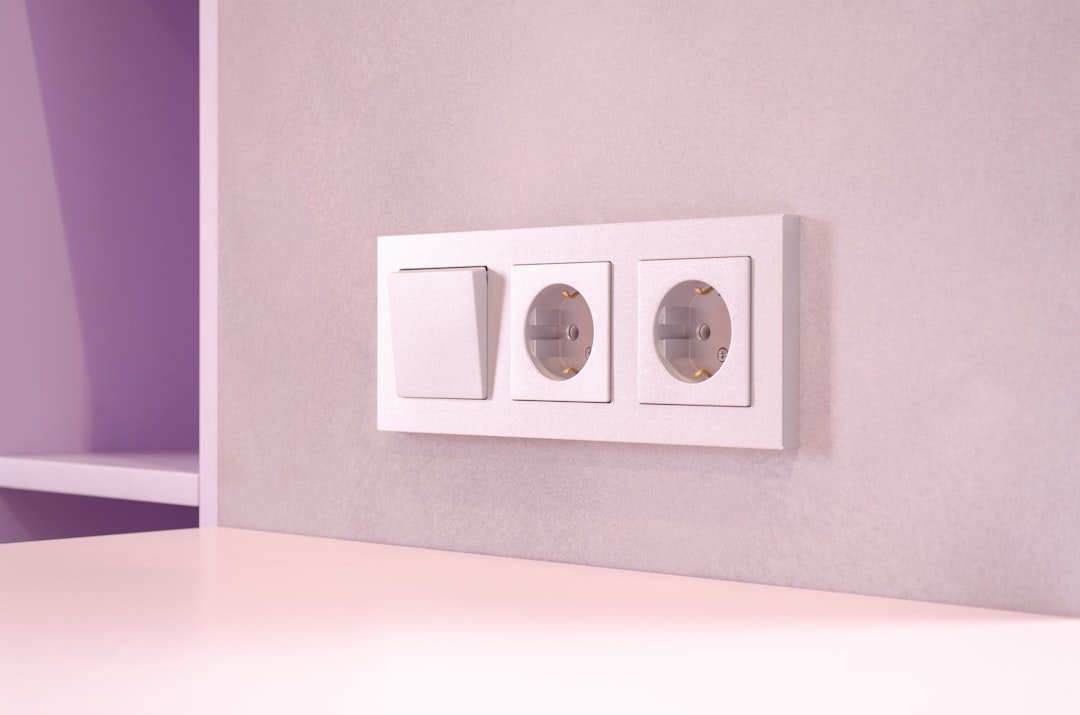a-room-with-a-white-table-and-a-purple-wall-mhduilbnwgw